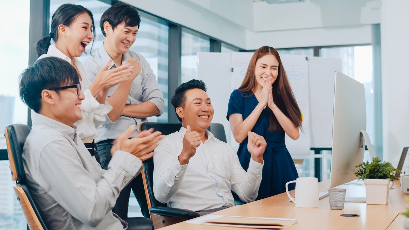 millennial-group-young-businesspeople-asia-businessman-businesswoman-celebrate-giving-five-after-dealing-feeling-happy-signing-contract-agreement-meeting-room-small-modern-office